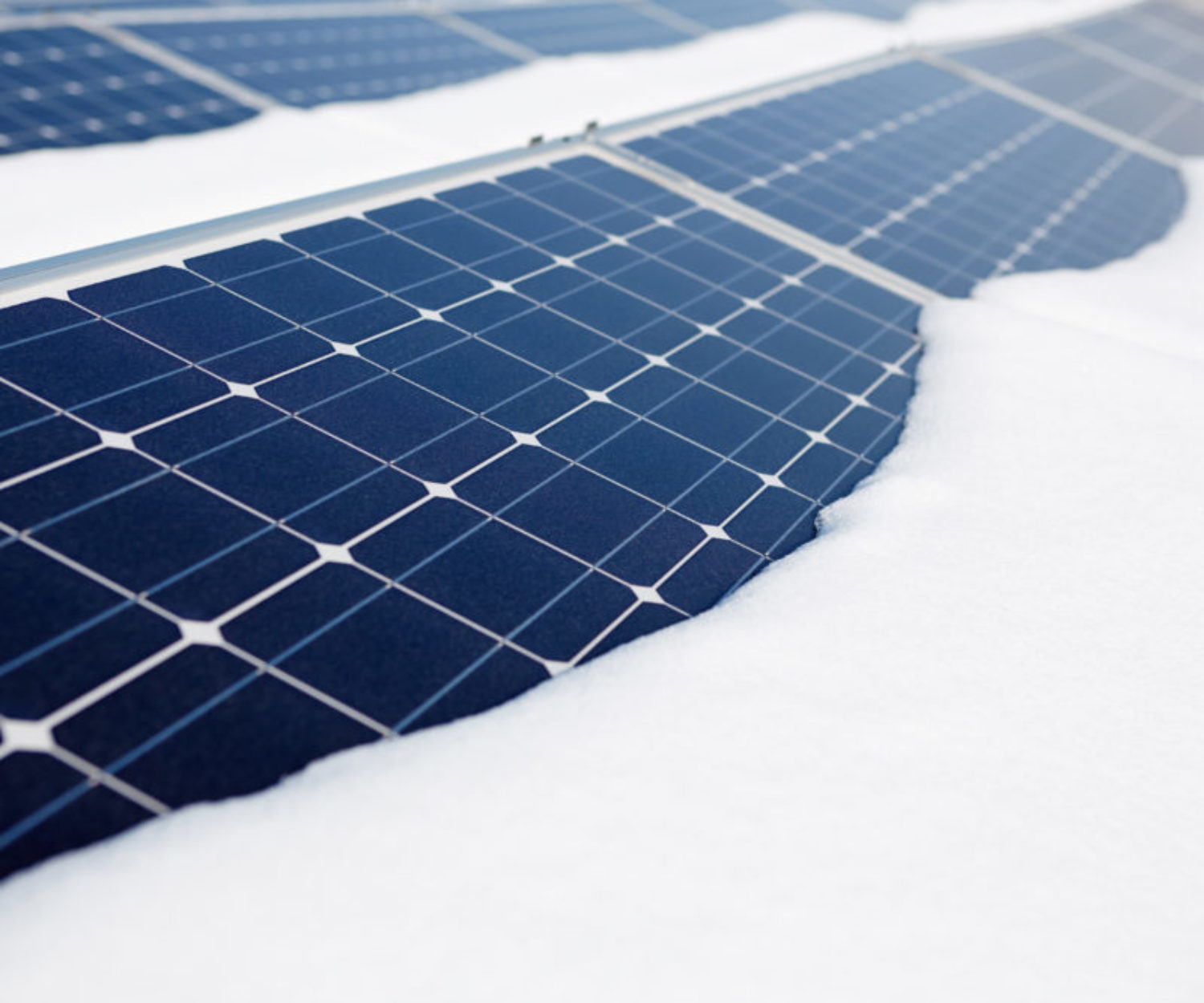 photovoltaic modules in winter covered by snow